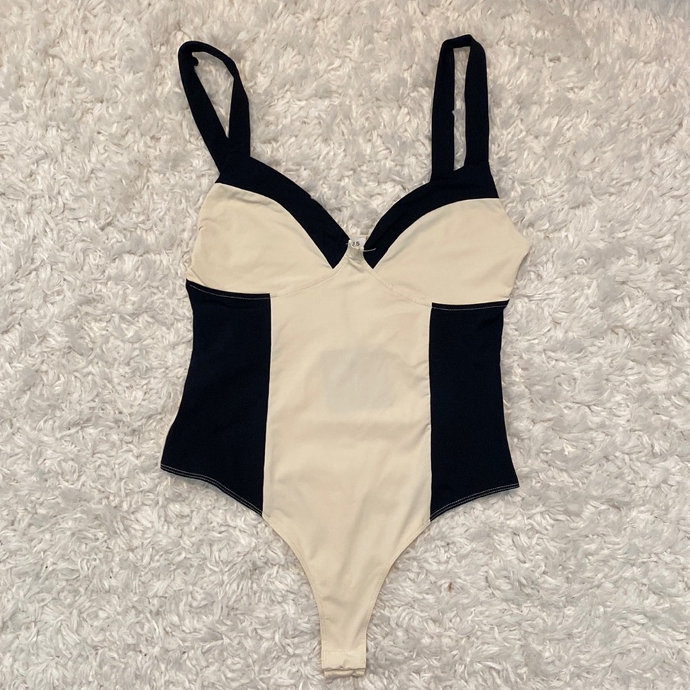 Tan and black body suit. Size medium. Brand - Lelis.